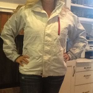 Women's white ski jacket. Grey sleeves.
