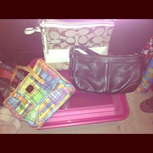 Colorful Dooney & Burke purse and One black Coach