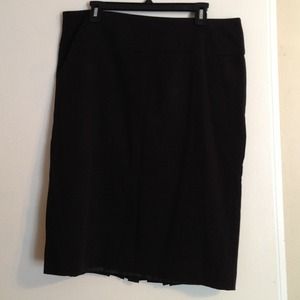 Black fully lined skirt.