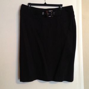 Black skirt with belt detail.