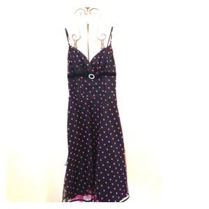 Black cocktail dress with pink polka dota