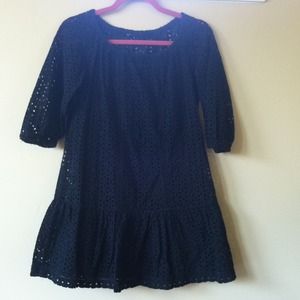 Black eyelets dress. Knee length n half sleeve.