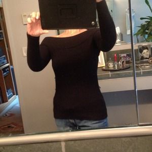 Off shoulder sweater. "HOLD"