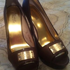 RESERVED.  Michael Kors 8.5 brown heels