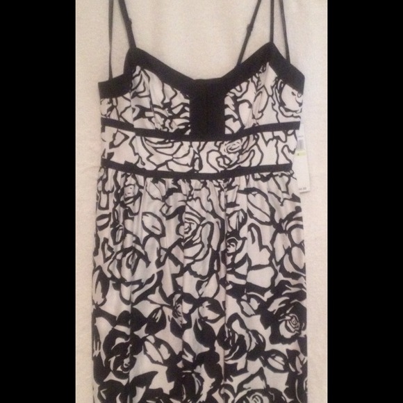 White and black spaghetti strap dress.