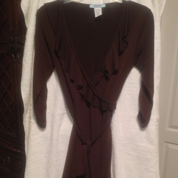 Deep brown wrap dress with scalloped neckline.