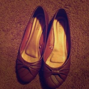 Brown/tan leather flats with bow