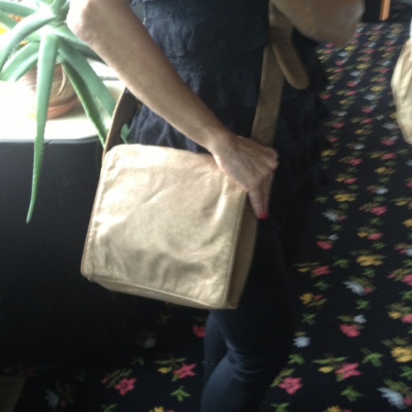 SALE!  DKNY bronze leather cross body bag.