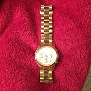 Never been worn Gold Michael Kors watch