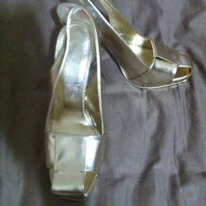 YSL gold sling backs with Raffia heel