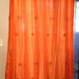 3 Orange curtain..