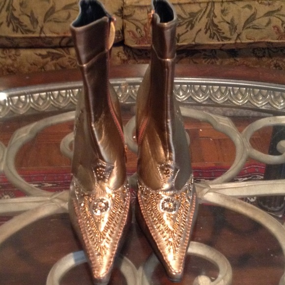 Gold detailed ankle boots