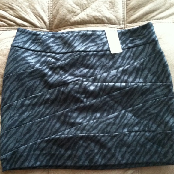 SOLD!!!! A new, never worn Express Skirt with tags