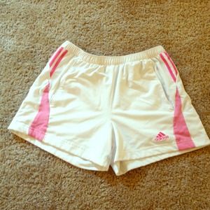 White with pink detail Adidas running shorts