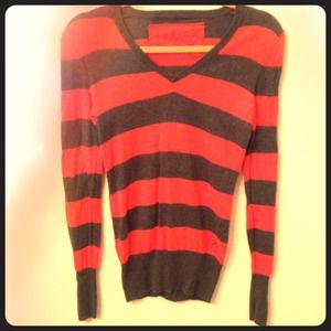 Orange and gray striped v-neck sweater