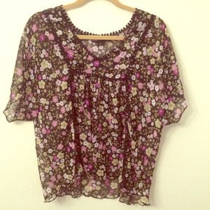 Sheer black shirt with floral pattern