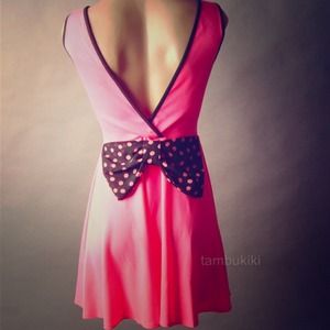 Party dress with low cut back and bow. SZ M