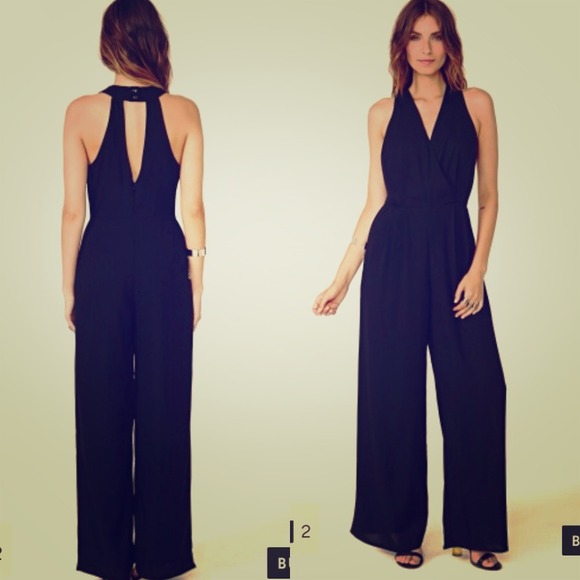 🎉🎉HOST PICK 10/22🎉🎉 Black perpetual  jumpsuit.