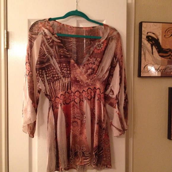 Sheer 3/4 length sleeve high waisted blouse.