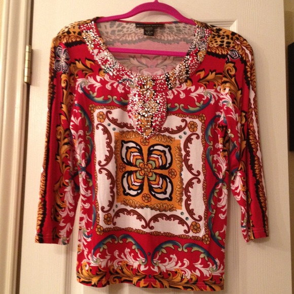 Multi-colored top with studs and rhinestones.