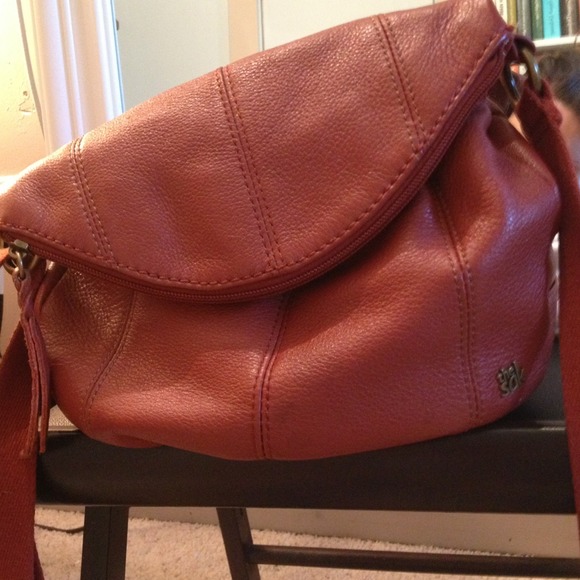 Gently used burnt oarnge the sak leather purse