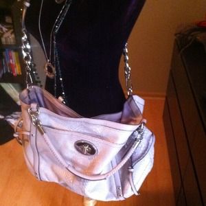 Light pink COACH crossbody with wallet included.