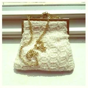Cream beaded evening bag.
