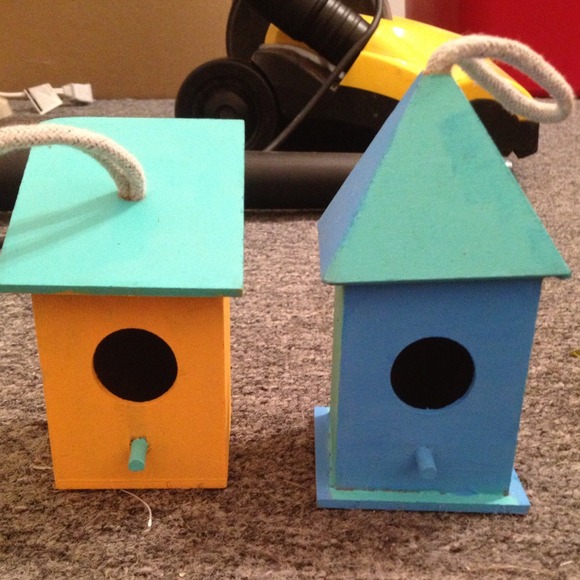 Hand painted bird houses made from paper mâché