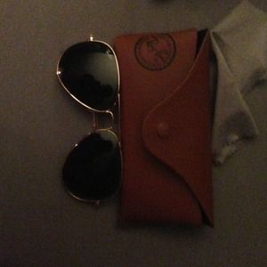 Brand new, never worn, gold ray ban sunglasses.