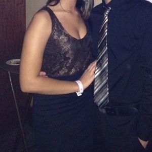 Size Medium fitted Black and Gold Express dress