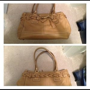 All leather tan coach purse.