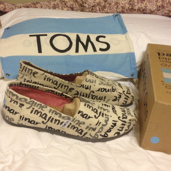 Toms miss-matched shoes; left 9.5, right 9