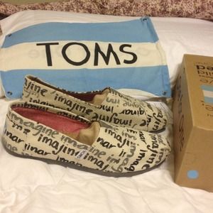 Toms miss-matched shoes; left 9.5, right 9