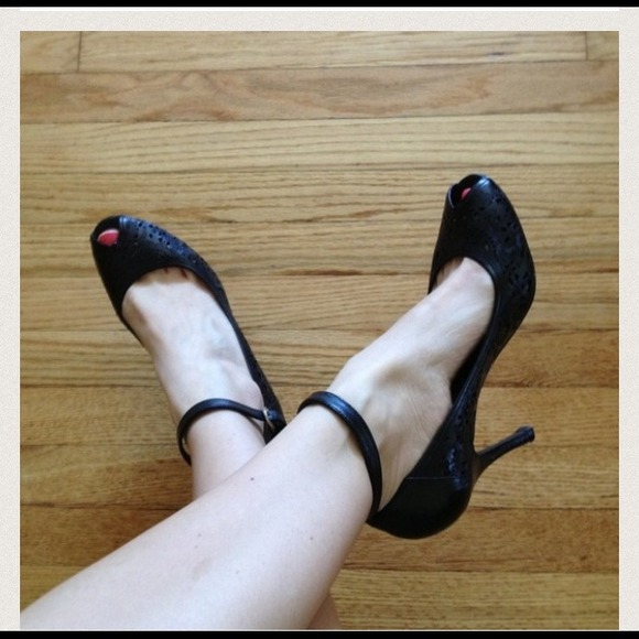 BCBG black cut out heels. Sold