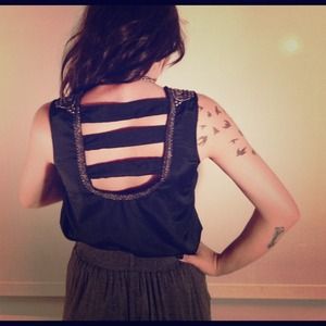 Navy blue & jeweled shoulder pads too.