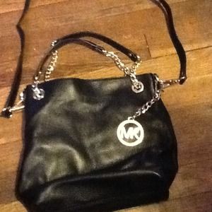 Michael kors multi way leather bag.