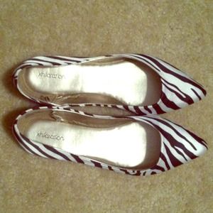 Zebra print pointed toe flats