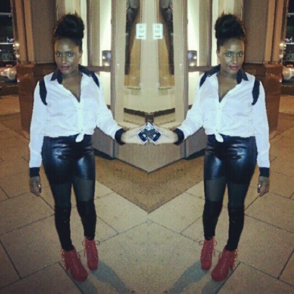 Black leather leggings with sheer cutouts