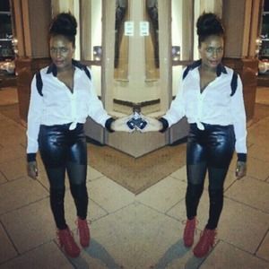 Black leather leggings with sheer cutouts