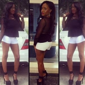 Black and sheer peplum top