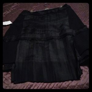 Set of two embellished black skirts