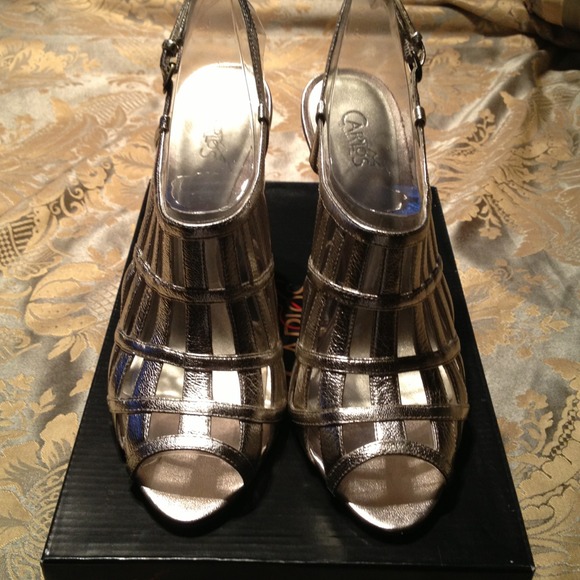 Carlos Santana gold sandals