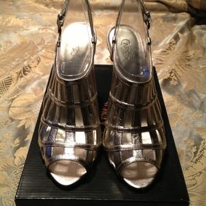 Carlos Santana gold sandals