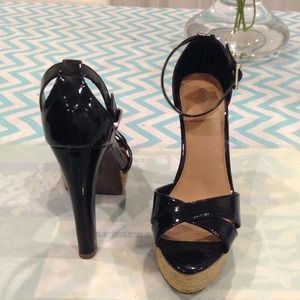 Sky high heels! Black patent platforms.