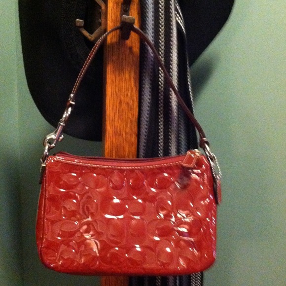 Coach red patent leather purse.