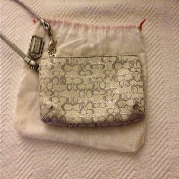 Sold💯% Authentic Coach Silver Wristlet