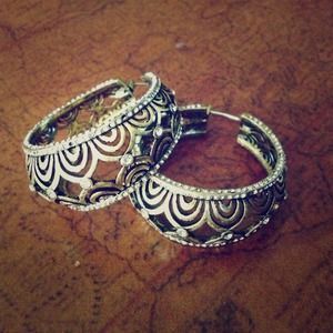 Beautiful antique gold snap back earrings.