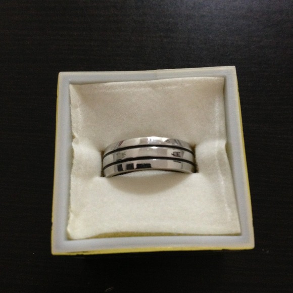 Shiny striped metal ring