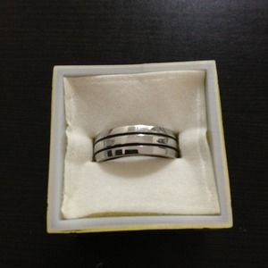 Shiny striped metal ring