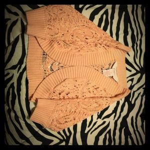 cardigan along with butterfly earrings